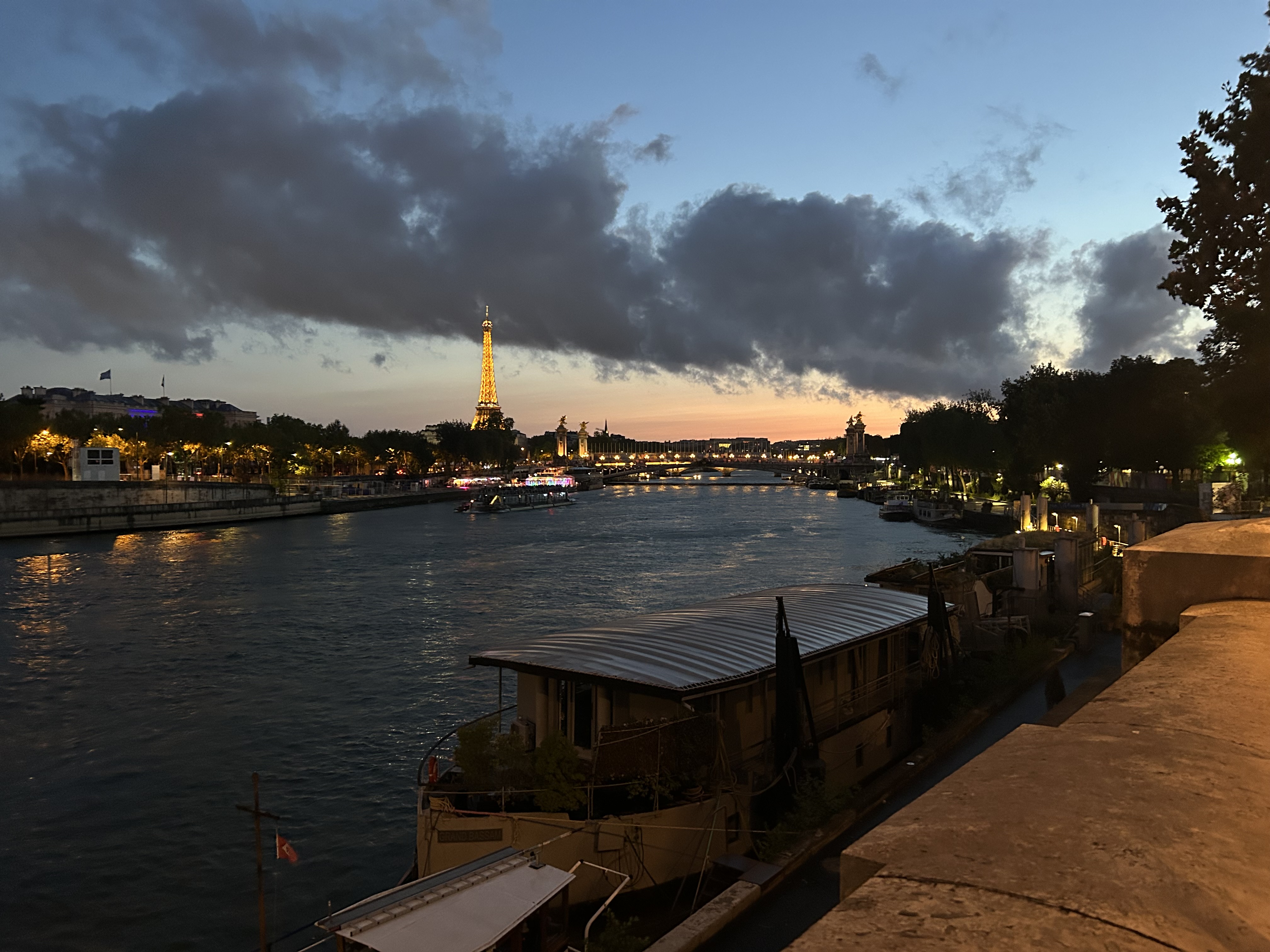 Evening view over the Seine with the Eiffel Tower in Paris.